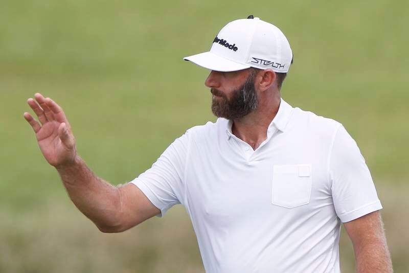 Dustin Johnson of the USA acknowledges the crowd after sinking his putt during the LIV Golf Invitational Bangkok golf tournament at Stonehill Golf Course in Pathum Thani province. EPA