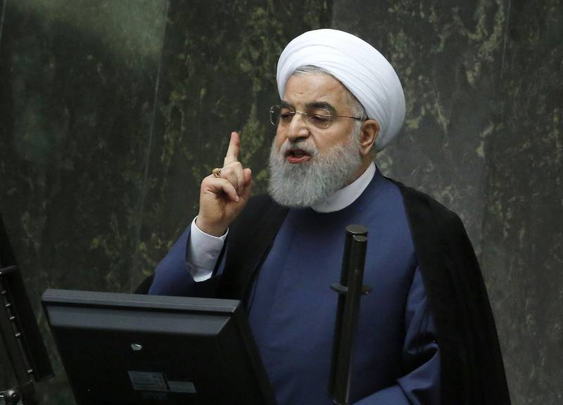 President Hassan Rouhani speaks at the Iranian Parliament in the capital Tehran, on August 28, 2018. - It was the first time Rouhani had been summoned by parliament in his five years in power, with MPs demanding answers on unemployment, rising prices and the collapsing value of the rial, which has lost more than half its value since April. (Photo by ATTA KENARE / AFP)