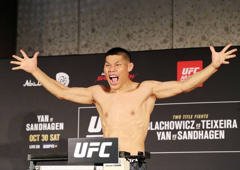 Welterweight Li Jingliang weighs in before UFC 267.
