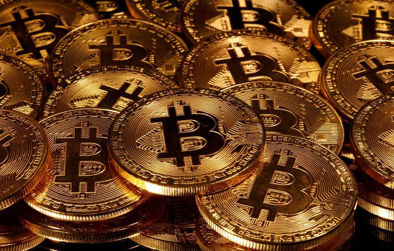 FILE PHOTO: Representations of virtual currency Bitcoin are seen in this picture illustration taken taken March 13, 2020. REUTERS/Dado Ruvic/Illustration/File Photo