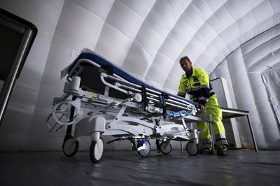 Emergency forces install an air dome equipped with medical supplies at Spallanzani hospital in case the number of people suffering from coronavirus increases, Rome, Italy. EPA