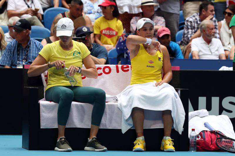 Ashleigh Barty of Australia wipes her face during a break in play. AFP