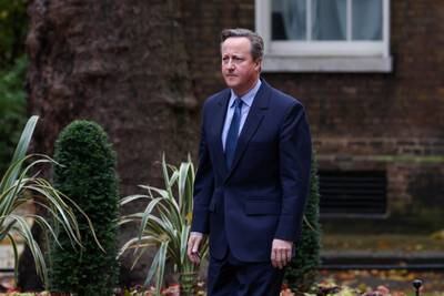 Mr Cameron arrives at 10 Downing Street, seven years after he stepped down as prime minister. Reuters