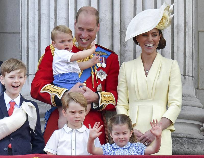 (L-R) Albert Windsor, Britain's Prince William, Duke of Cambridge holding Prince Louis, Prince George, Princess Charlotte and Britain's Catherine, Duchess of Cambridge stand with other members of the Royal Family on the balcony of Buckingham Palace to watch a fly-past of aircraft by the Royal Air Force, in London on June 8, 2019. - The ceremony of Trooping the Colour is believed to have first been performed during the reign of King Charles II. Since 1748, the Trooping of the Colour has marked the official birthday of the British Sovereign. Over 1400 parading soldiers, almost 300 horses and 400 musicians take part in the event. (Photo by Daniel LEAL-OLIVAS / AFP)