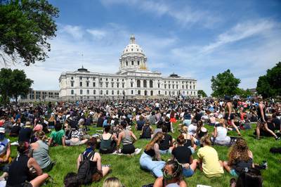 Thousands of protesters turn out for a sit-in at the State capitol, more than a week after George Floyd's death while under arrest, in St Paul, Minnesota.  EPA