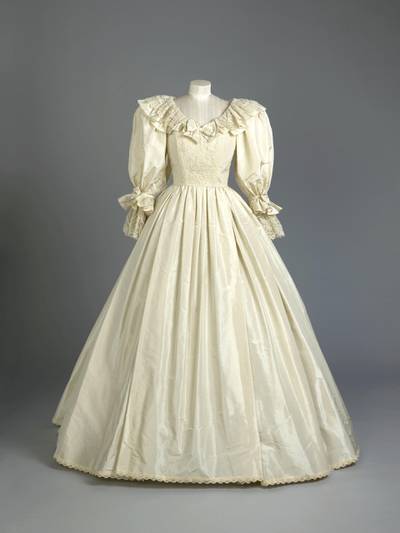 The dress - with its billowing sleeves, bows and lace flounces - will be the star attraction. Royal Collection Trust