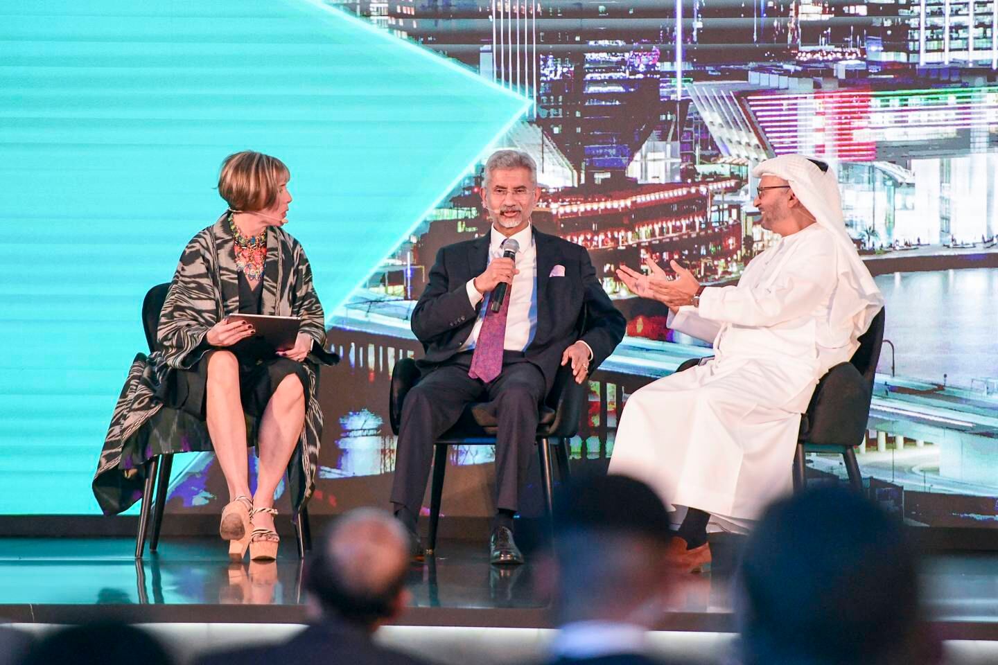 From left, moderator Edie Lush, India's Minister of External Affairs Subrahmanyam Jaishankar and Dr Anwar Gargash, diplomatic adviser to the President, at the India Global Forum in Abu Dhabi. Khushnum Bhandari / The National
