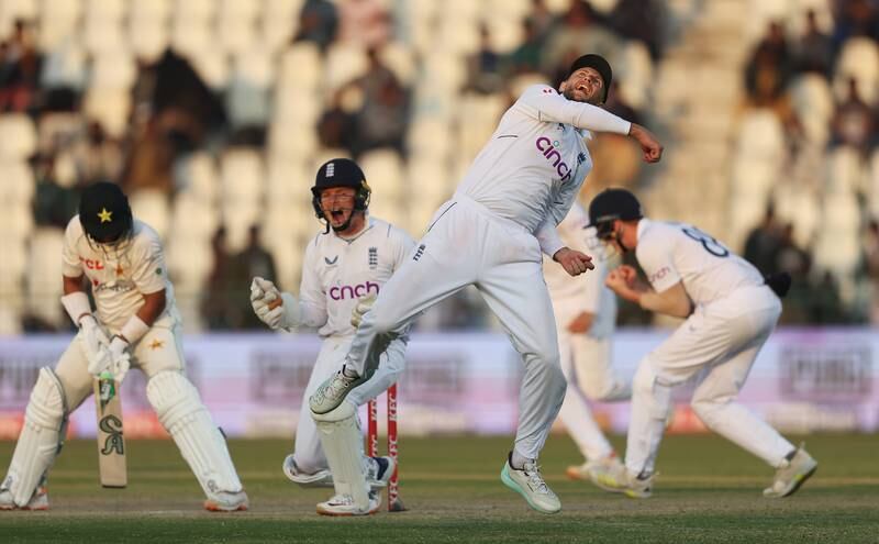England's Joe Root celebrates catching Imam-Ul-Haq of Pakistan during day three of the second Test at Multan Cricket Stadium on December 11, 2022. Getty