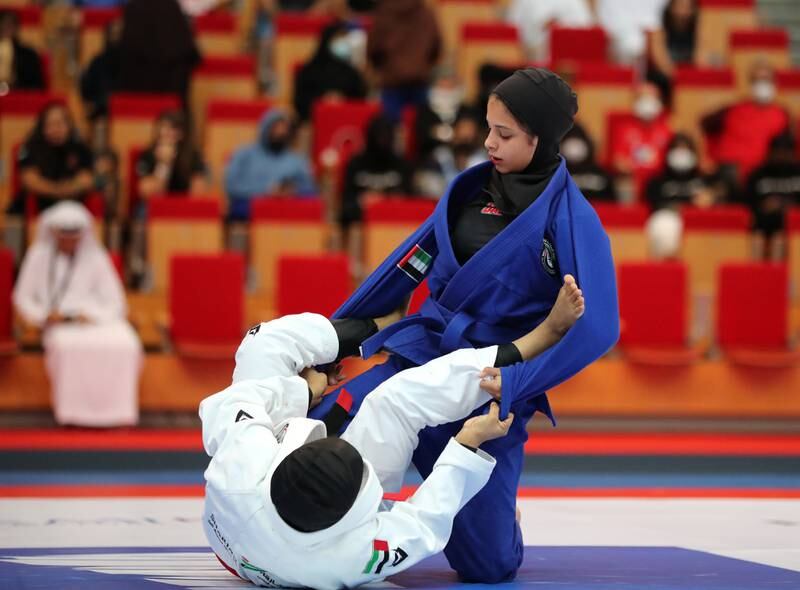 Balqees Abdulla of Palm Sports Team 777, right, takes on Shamma Al Blooshi of Sharjah Self Defence Sports Club in the women's bronze medal match in the President's Cup. 