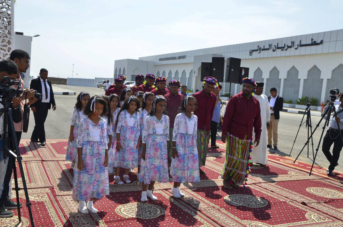 Local singers and dancers perform traditional Yemeni folklore in celebration of the opening of the airport. Saeed Al-Batati for The National.

