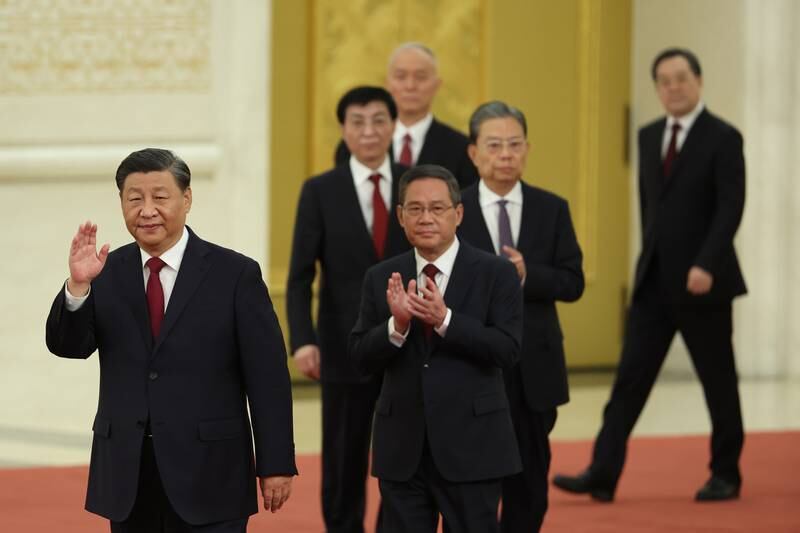 Mr Xi, Li Qiang, Zhao Leji, Wang Huning, Cai Qi, Ding Xuexiang and Li Xi, attend the Politburo Standing Committee meeting. Getty