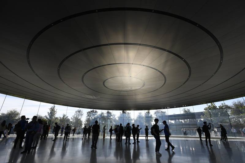 Attendees arrive for an Apple event at the Steve Jobs Theatre in Cupertino, California. Bloomberg