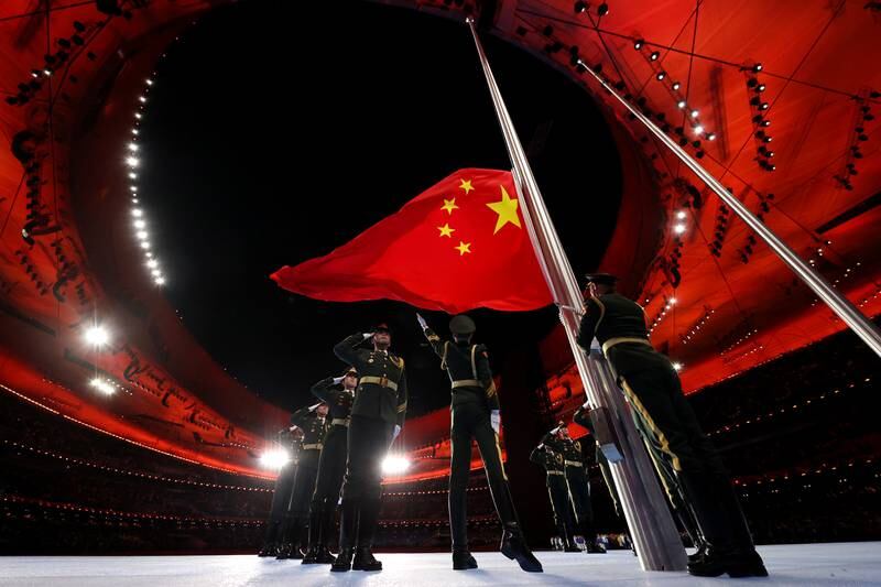 China's flag is raised at the opening ceremony of the Beijing  Winter Olympics on February 4. Getty Images