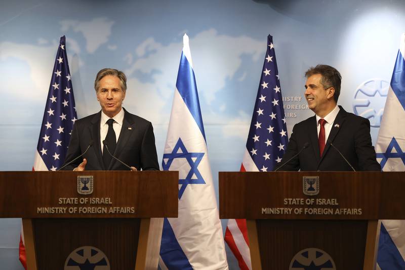Mr Blinken, left, and Israeli Foreign Minister Eli Cohen speak to the media in Jerusalem. AP