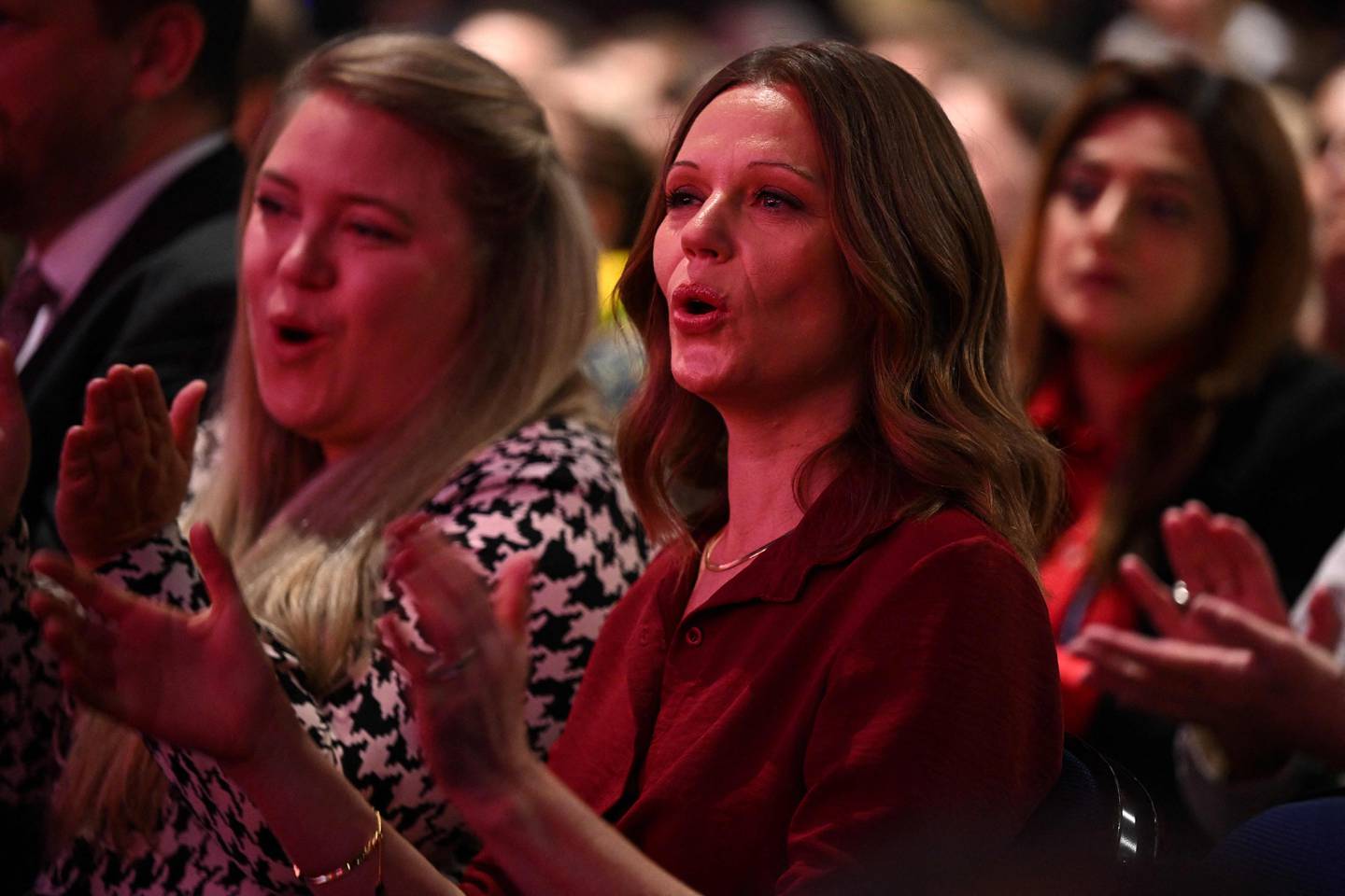 Victoria Starmer cheers on her husband during his speech at the Labour party conference in Liverpool on Wednesday. AFP