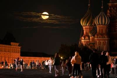 The August Blue Supermoon behind the St Basil's Cathedral in Red Square in Moscow. AP