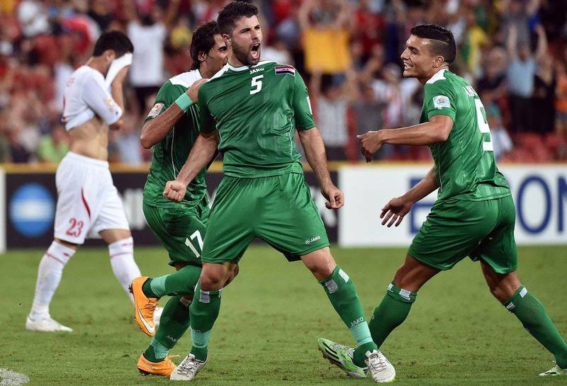 Iraq's Yaser Kasim celebrates after scoring the winning goal against Jordan in a 1-0 win at the Asian Cup on Monday in Brisbane, Australia. Saeed Khan / AFP / January 12, 2015