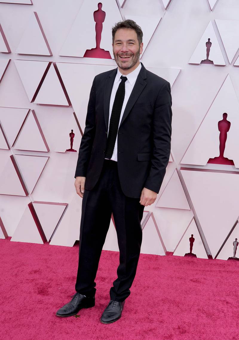 Dan Swimer arrives at the 93rd Academy Awards at Union Station in Los Angeles, California, on April 25, 2021. AP