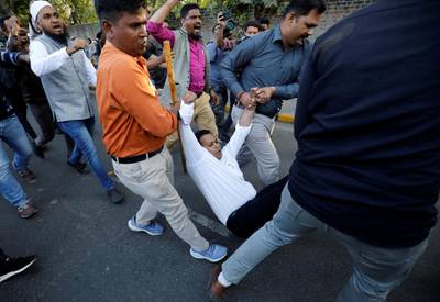 Police detain demonstrators during a protest to show solidarity with the students of New Delhi's Jamia Millia Islamia university after police entered the university campus on the previous day, following a protest against a new citizenship law, in Ahmedabad, India, December 16, 2019. REUTERS/Amit Dave