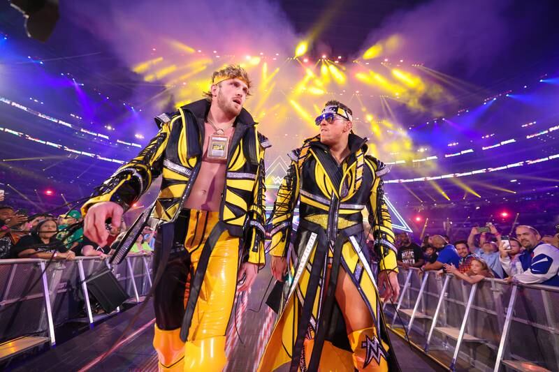 Logan Paul and The Miz walk out together at WrestleMania 38. All photos: WWE 