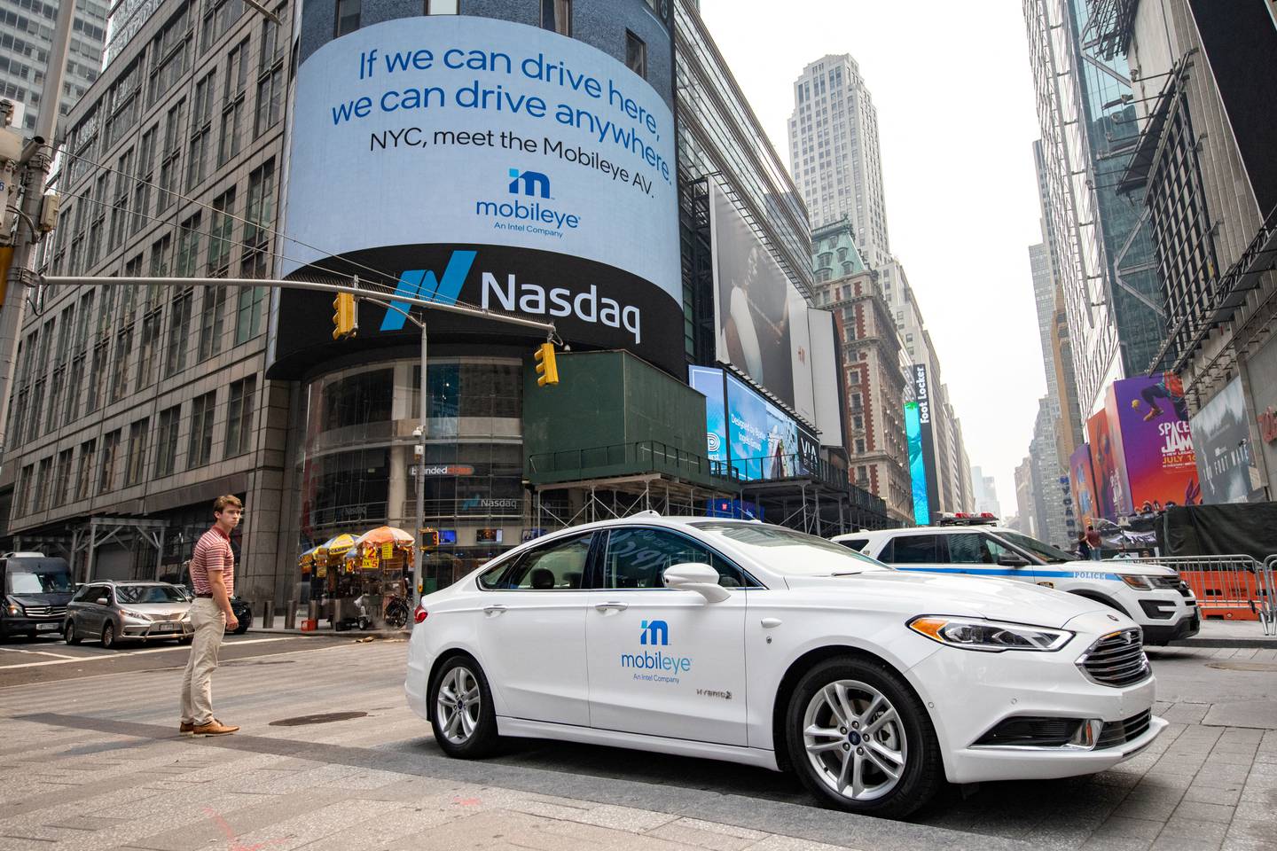 A Mobileye driverless car at the Nasdaq Market site in New York. The unwelcoming market conditions have forced highly anticipated listings such as Mobileye to be pushed back or scrapped altogether. Reuters