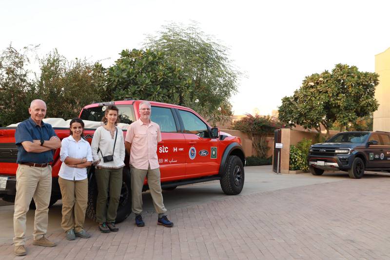 The team pose with the second support vehicle for the trip, nicknamed "the beast" by head of logistics Alan Morrissey. Photo: Osama Farhan / British Embassy Riyadh