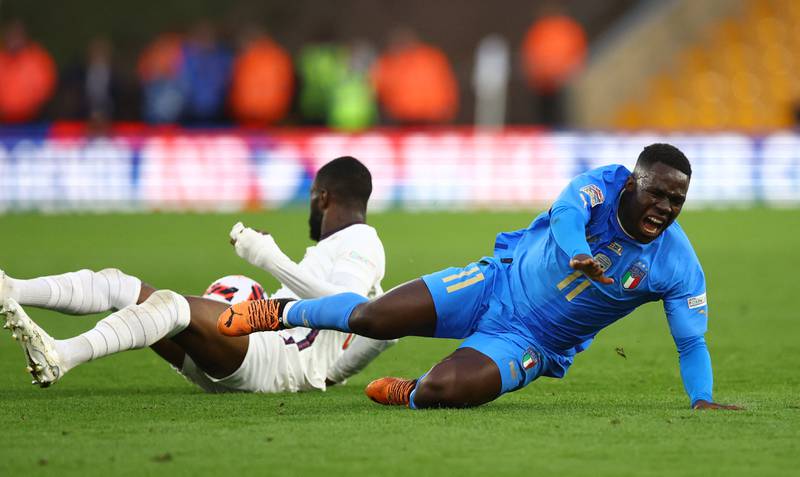 England's Fikayo Tomori in action with Italy's Wilfried Gnonto. Reuters
