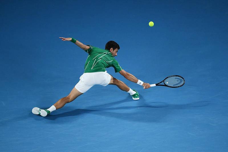 Novak Djokovic plays a backhand. Getty