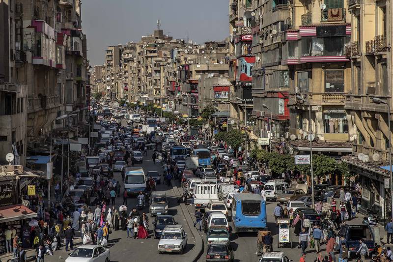 People crowd a street in Cairo. Egypt is one of the largest economies to take part in the Brics expansion and the government is attempting to transform the country into the hub of an East Africa-to-Europe corridor. AP
