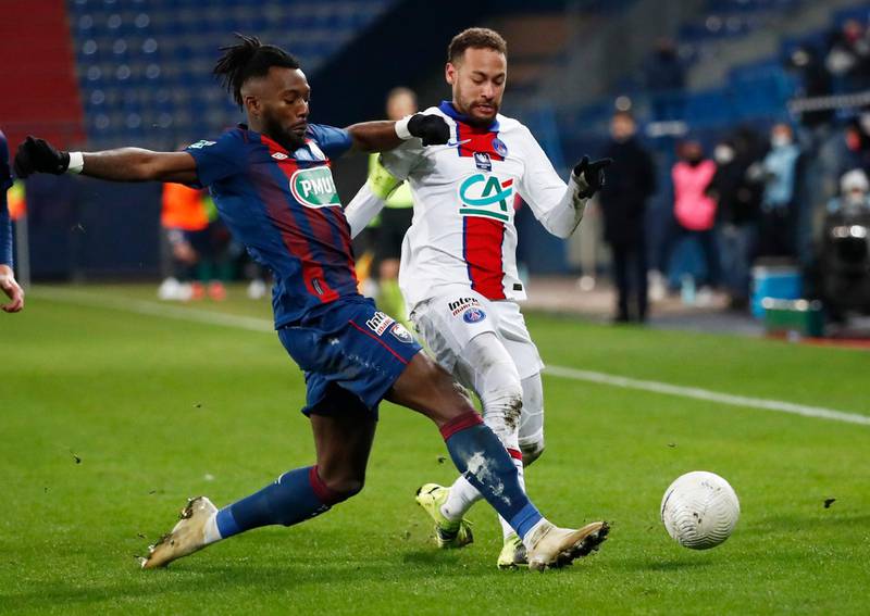 Caen's Steeve Yago challenges Neymar during the French Cup tie. Reuters