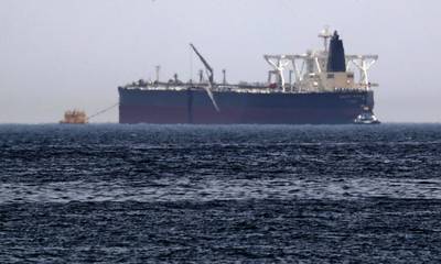 A picture taken on May 13, 2019, shows the crude oil tanker, Amjad, which was one of two Saudi reported tankers that were damaged  in mysterious "sabotage attacks", off the coast of the Gulf emirate of Fujairah. - Saudi Arabia said two of its oil tankers were damaged in mysterious "sabotage attacks" in the Gulf as tensions soared in a region already shaken by a standoff between the United States and Iran. (Photo by KARIM SAHIB / AFP)