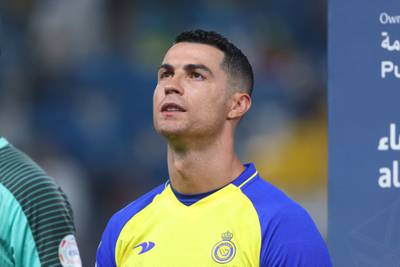 Al Nassr's Portuguese forward Cristiano Ronaldo stands for the anthem ahead of the Saudi Pro League match against Al Shabab at Al Awwal Park. AFP
