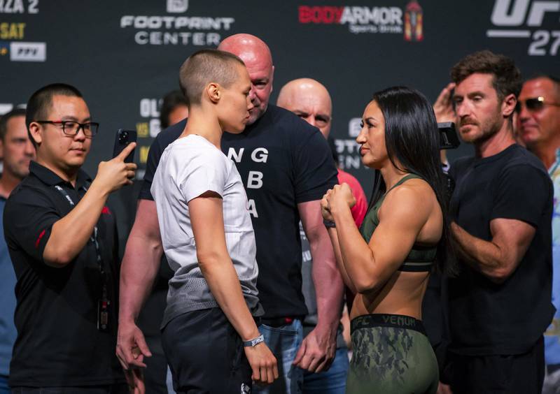Rose Namajunas faces off with Carla Esparza during the weigh-in for UFC 274. Reuters