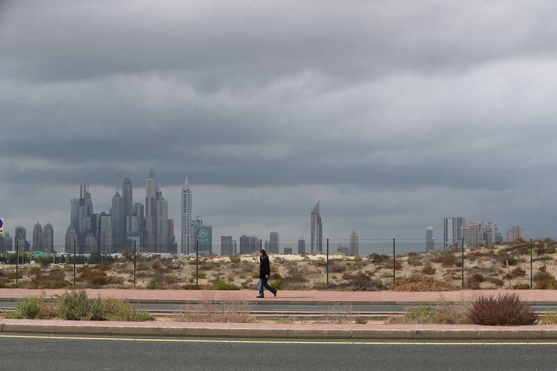 Dark rain clouds over Dubai in January. Pawan Singh / The National