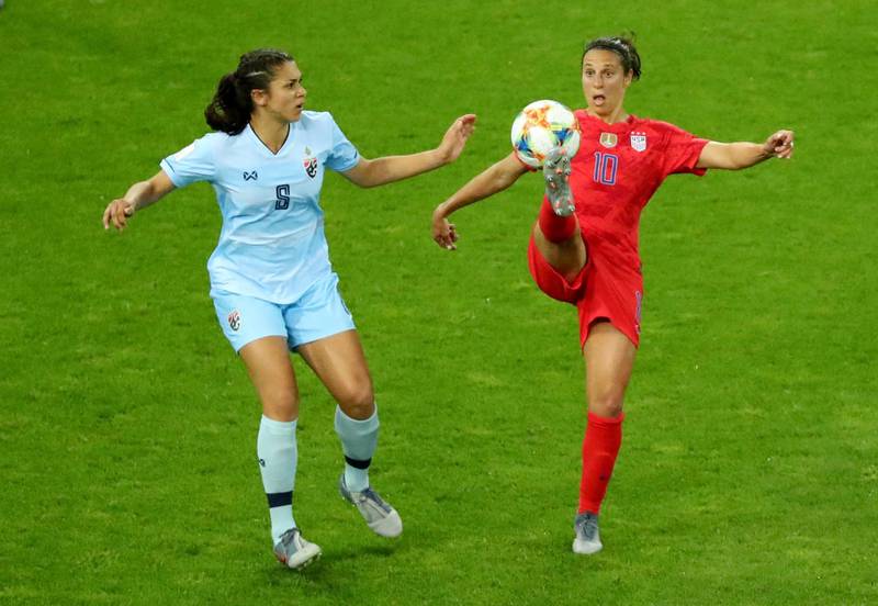 Thailand's Miranda Nild, left, in action with Carli Lloyd of the US. Reuters