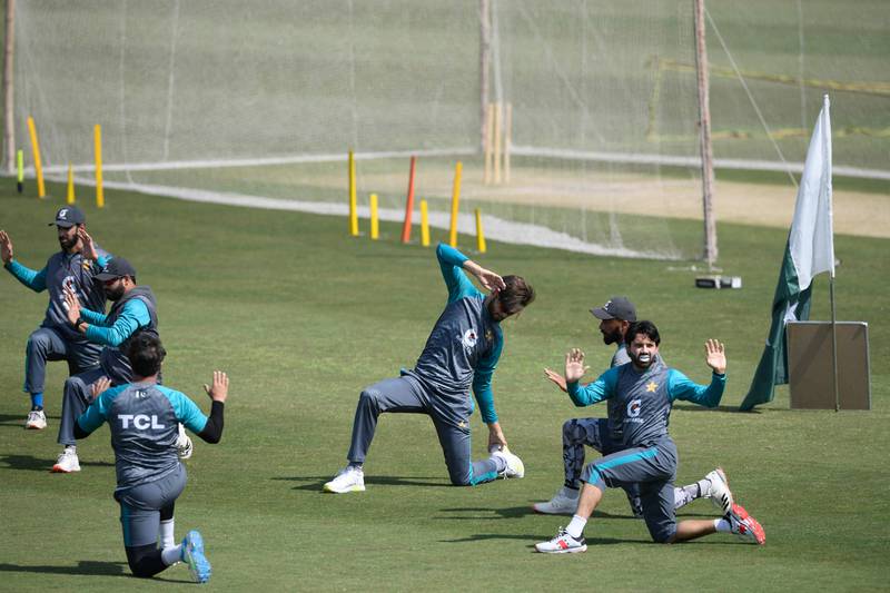 Pakistan's players exercise during a practice session at the Rawalpindi Cricket Stadium. AFP