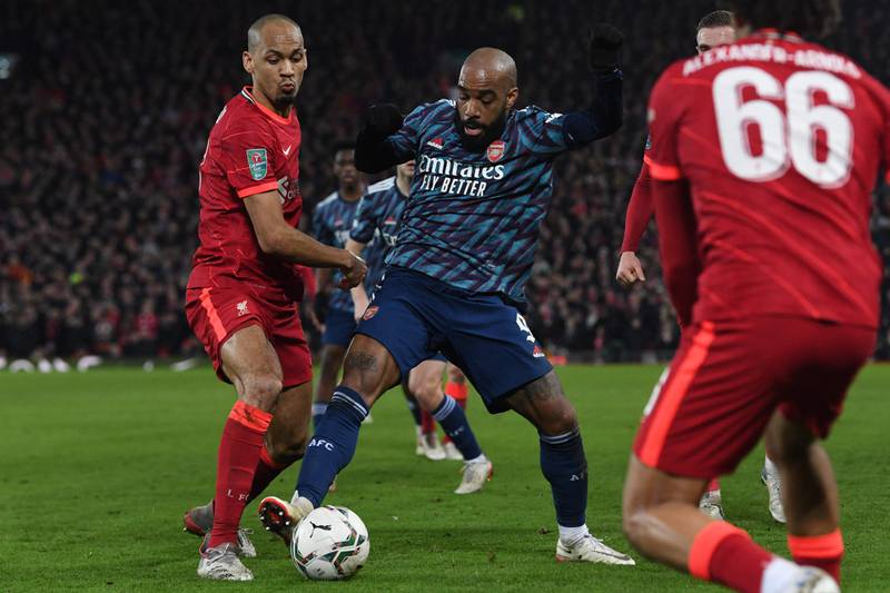 Alexandre Lacazette - 7. The Frenchman put in a shift, holding the ball up and tracking back to help the weakened midfield. He was exhausted by the final whistle. AFP
