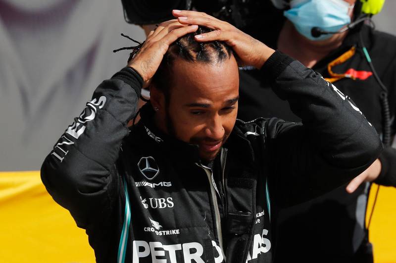 Formula One driver Lewis Hamilton, of Mercedes, after wining the British Grand Prix for the seventh time at Silverstone on Sunday, August 2. Reuters