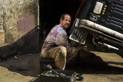 Gamal Sayed, 43, says he works 18 hours a day to support himself and his seven-year-old daughter and hopes former military chief Abdel Fattah El Sisi wins the presidential election and does something to improve life for Egyptians like him. David Degner for The National 