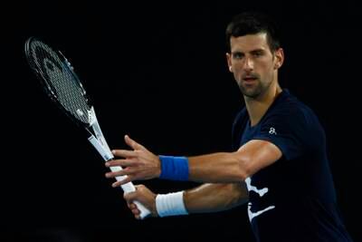Novak Djokovic plays a forehand during a practice session ahead of the 2022 Australian Open at Melbourne Park. Getty Images
