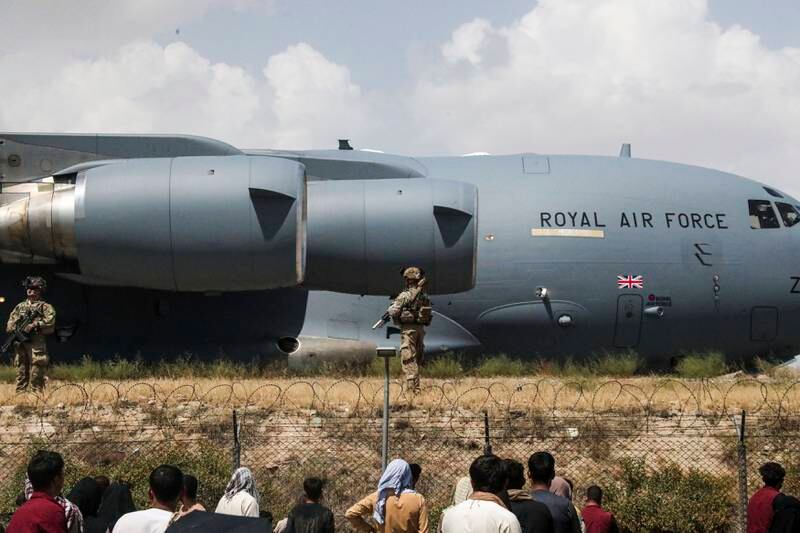 Members of the UK Armed Forces take part in evacuations from Kabul airport in August. AP Photo