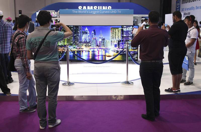 Samsung unveils its 85-inch ultra-high-definition curved-screen TV at Gitex Shopper in Dubai. Lee Hoagland / The National