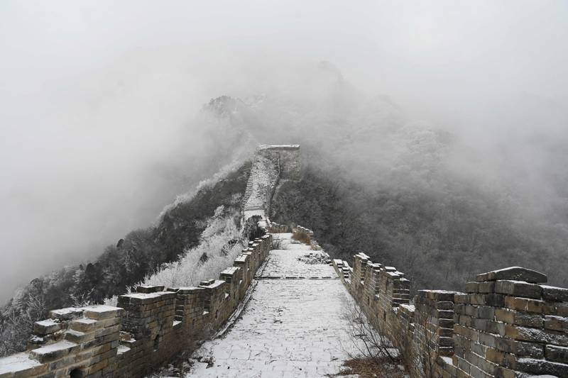 The Great Wall of China is dusted with snow at Jiankou, north of Beijing. AFP