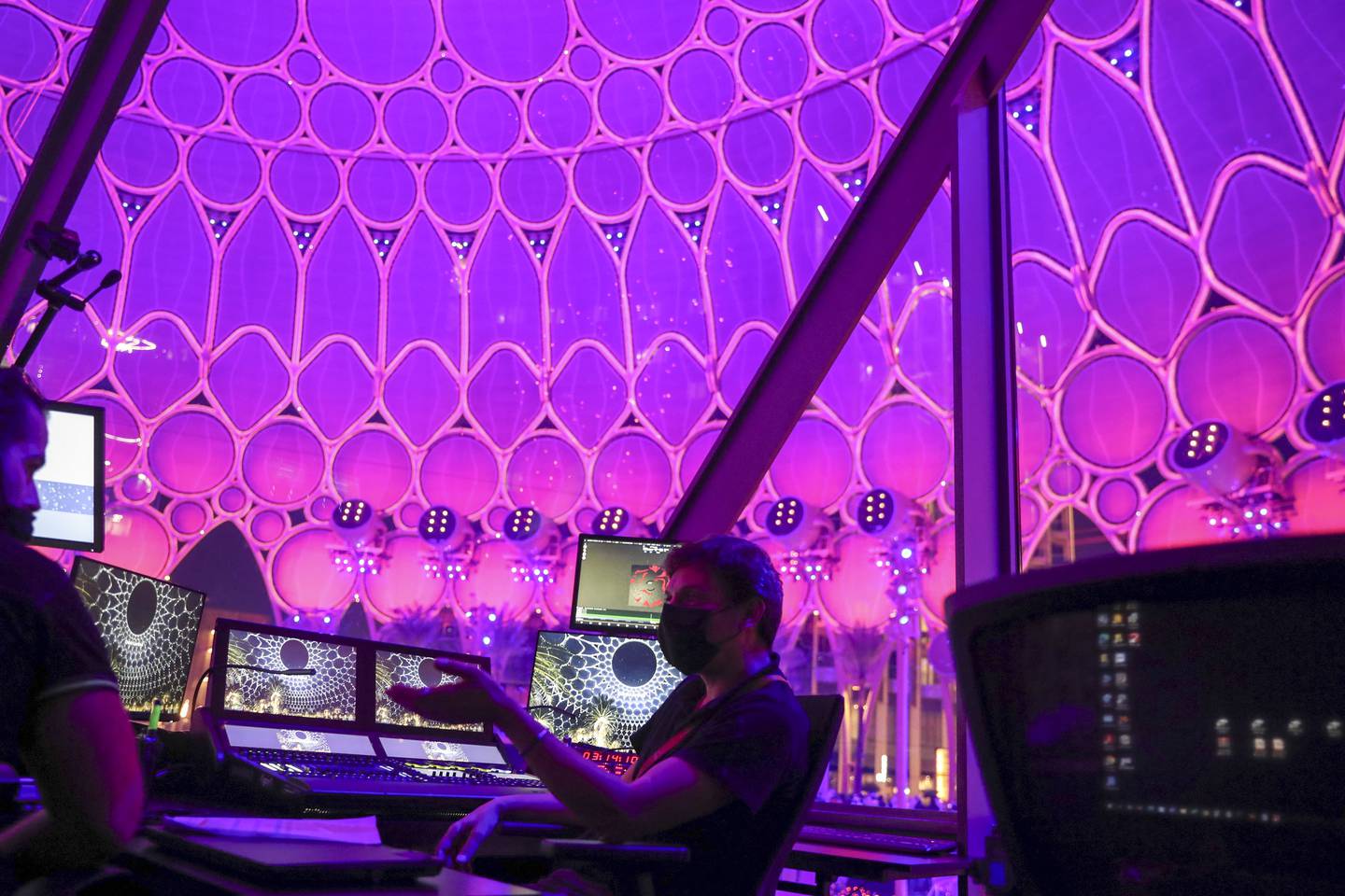 The quiet, darkened central control room is the staging area that fires up content for the world's largest immersive dome at Dubai Expo 2020. Khushnum Bhandari / The National
