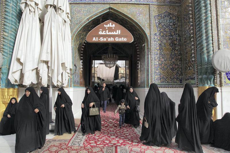 Pilgrims enter the Imam Ali Shrine through Bab al Sa'ah, The Clock Gate. Leila Molana-Allen for The National