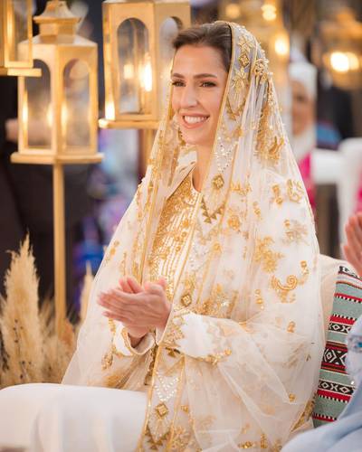 The bride-to-be wore a white abaya with gold beadwork by Saudi designer Honayda Serafi