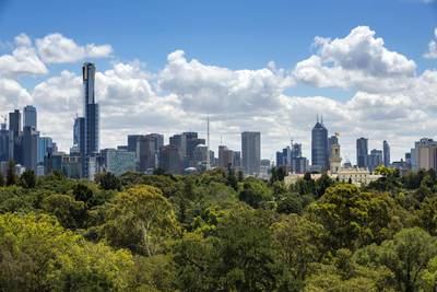 The Royal Botanic Gardens in Melbourne with the city’s skyline in the background.