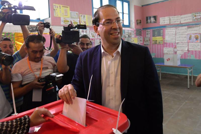 Tunisian Prime Minister Youssef Chahed casts his ballot for presidential election at a polling station in La Marsa on the outskirts of the capital Tunis. Rarely has the outcome of an election been so uncertain in Tunisia, the cradle and partial success story of the Arab Spring, as some seven million voters head to the polls today to choose from a crowded field.  AFP