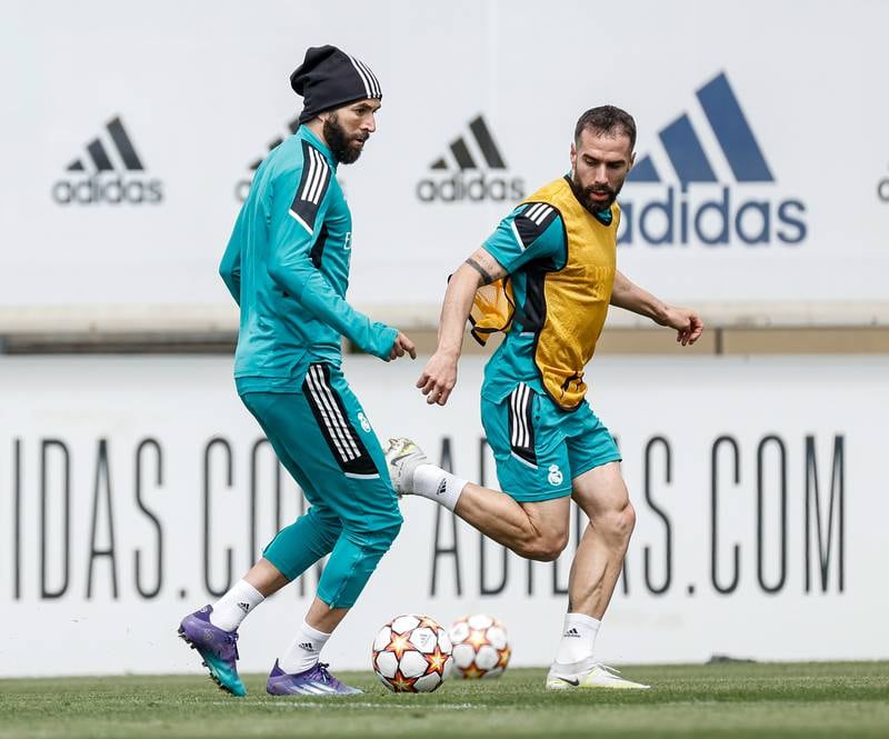 Benzema and Dani Carvajal during Real Madrid's training session. Getty