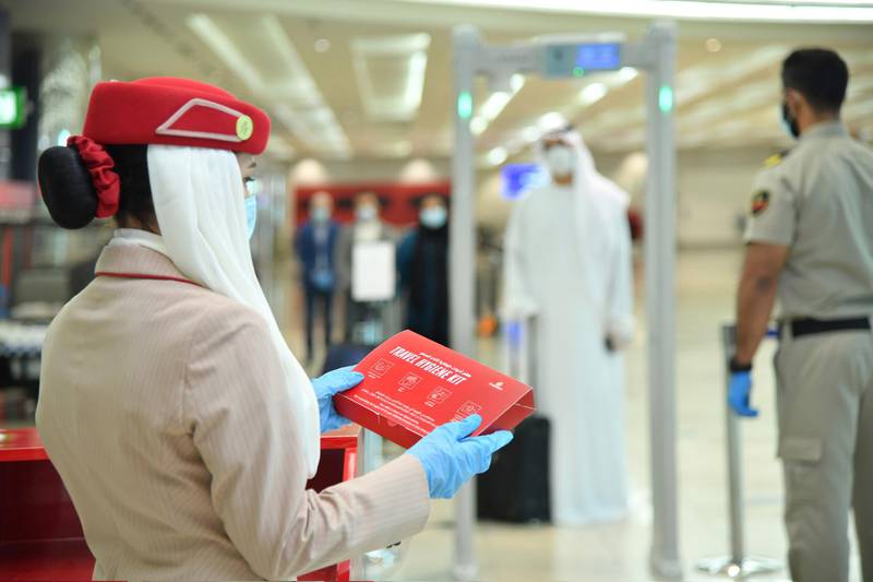 Emirates passengers receive hygiene kits at check-in. Courtesy Emirates